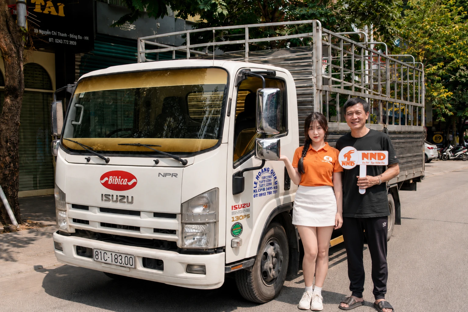 Isuzu NPR sau khi dán phim cách nhiệt kính lái XT20-5 màu vàng tại Nguyễn Chí Thanh Hà Nội